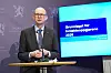 Geir Axelsen presenterer TBU-rapport om grunnlaget for lønnsoppgjøret 2026 ved en talerstol.