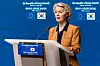 Ursula von der Leyen speaks at a podium during an EU–Republic of Korea summit media briefing in Brussels.