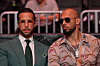 Andrew og Tristan Tate sitter sammen under UFC 327 i Miami.